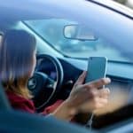Woman discovers a hidden AI camera in her rental car recording her and warning about unsafe driving